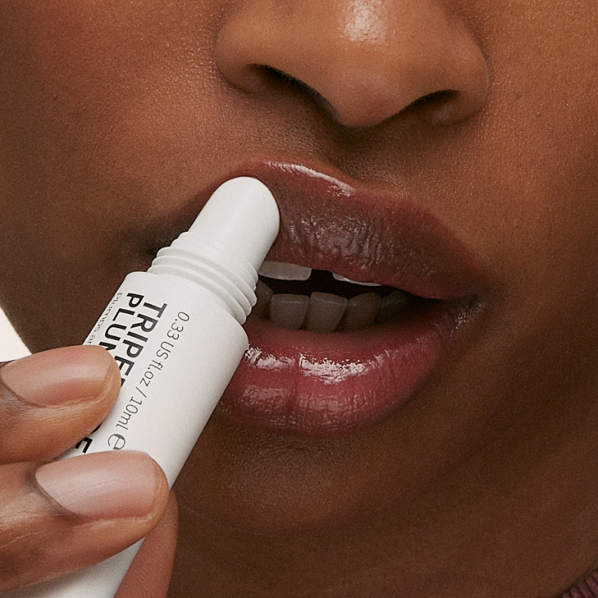 tripeptide-plumping-berry-lip-balm-z6 ApplicationBerry.jpg